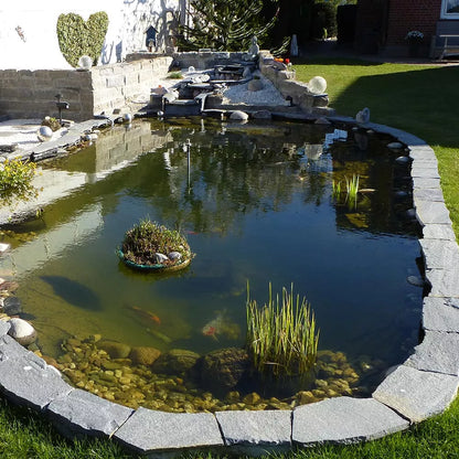 Natural stone pond edging made of Deep Sea quartzite rubble slabs